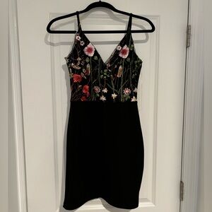 Black mini dress with floral bodice